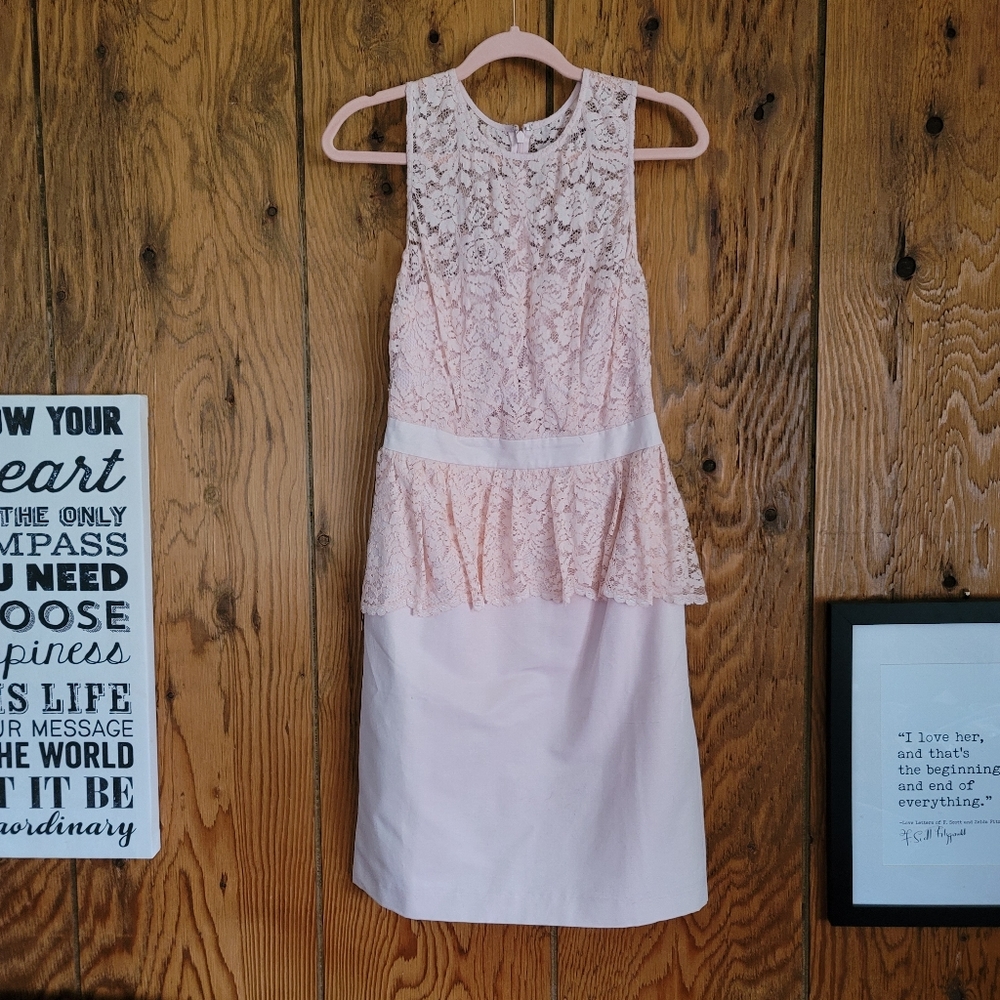 Adorable pale pink peplum dress. Size 4. Worn once.